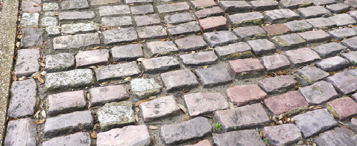 Uneven stone sidewalk