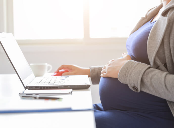 Pregnant woman working