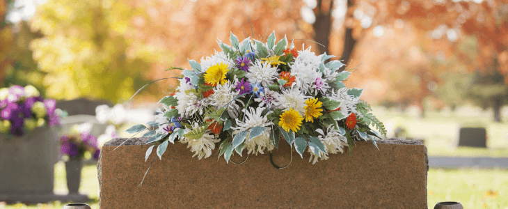 Flowers placed on a grave after a wrongful death accident